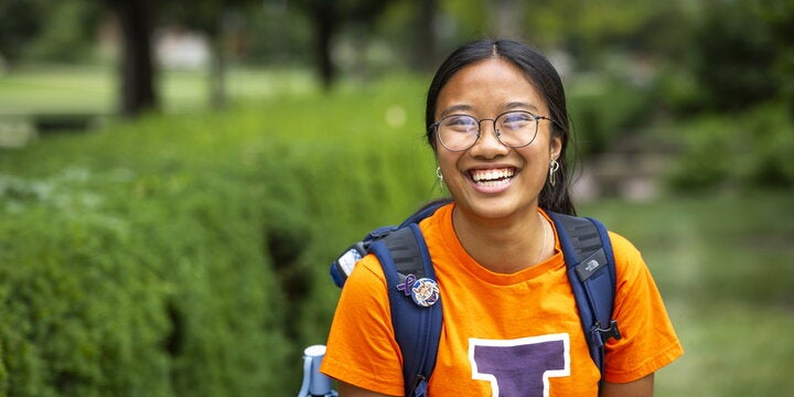 Smiling Illinois student with backpack.