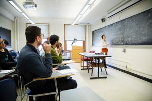 Professor teaching mathematics class.