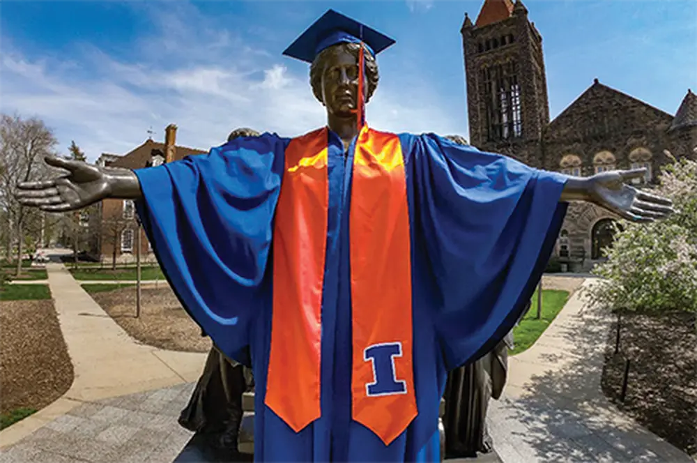 Alma Mater in graduation attire.